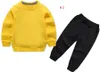 Ensembles de vêtements pour bébé en pur coton vêtements pour enfants col rond deux pièces pantalons à manches longues haut de gamme imprimé classique 2-8 ans pull de sport de printemps et d'automne