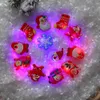 10 pezzi anelli di bagliore natalizio in un giocattolo per spilla scuro flash led Santa Snowman Shine Toys Party Child Child Navidad Party Decoration5742103