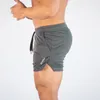 Pantanos cortos para hombres corriendo ropa transpirable entrenamiento gimnasio entrenamiento deportivo