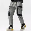 Herrbyxor mode streetwear stora fickor solid lappt￤cke jogging m￤n milit￤ra l￶sa byxor hip hop f￶r