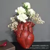 Vasi per vasi di fiori a forma di cuore Bottiglie Vasi per contenitori secchi in resina Vasi per vasi Scultura per il corpo Vaso per fiori da tavolo Ornamenti per la decorazione della casa