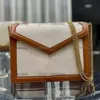 Cassandra Mini Chain Bag в холсте и гладкие кожаные женщины, мешки с перекрестным телом, классическая тотака, роскошные дизайнерские сумочки, топ -ручка, топ -качество 2022