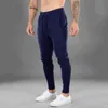 Calças masculinas Novo 2021 Jogging Sweetpantes Men's Gym Training Fitness Pant algodão Músculos Músculos Casual Running Sports Sports T220909