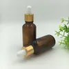 Flacone contagocce in vetro con coperchio dorato Contenitore per imballaggio da 30 ml per liquido E