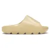 Wysokiej jakości kapcie buty sandały slajdy slajdy trenerzy suwaki suwaki męskie buty mody dhgate z kością pudełkową białą żywicą piaszczyste plaż
