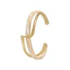 Braccialetti designer braccialetto che gira leggero a guscio bianco Bracciale flessibile texture metallica Ins Design di nicchia