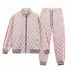 مصممي Luxurys للرجال للنساء Drees Fashion Tracksuits القصيرة الأكمام بنطلون جولة طوق الترتر التطريز الرياضة الرياضية 2 قطعة مجموعة S-XL