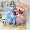 Keychains schattige grote ogen poppen pompom sleutelhanger echte vossen bont hanger voor dames tas auto sleutelhang telefoon fijne sieraden accessoires kinderen meisje cadeau t220909