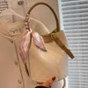 Minoritetspendlare handväska kvinnor 2022 nya modekänsla mångsidig en axel crossbody hinkväska purses outlet242u