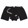 Designer famoso Summer Cotton Cotton Loose Fogss Shorts masculinos Lazer Os amantes da praia Ponta de praia corre e conforto