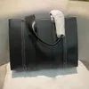 حقيبة حمل من جلد العجل أكياس تسوق كبيرة السعة العمودية خطوط العمودية حقائب اليد السوداء السوداء