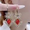 أنثى فاخرة كبيرة مستديرة طوق أزياء الأزياء الذهبية كواتير الزفاف الزورق الحجر Zircon Dangle Drop أقراط للنساء