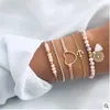 Artificial beaded jelly powder Bohemian wind woven bead chain love anchor tassel bracelet contrast suit jewelry