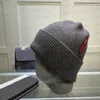 Mode stickad mössa mössa Designer dödskalle kepsar för man kvinna vinter hattar 5 färg högsta kvalitet