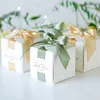 Cadeau Wrap Haut de gamme Faveurs de mariage Boîte-cadeau Boîtes de bonbons pour le baptême Baby Shower Anniversaire Fournitures de fête d'anniversaire Titulaires d'emballage avec ruban 220913