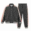 مصممي Luxurys للرجال للنساء Drees Fashion Tracksuits القصيرة الأكمام بنطلون جولة طوق الترتر التطريز الرياضة الرياضية 2 قطعة مجموعة S-XL