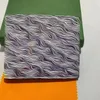 Bolsa de moedas de estilo da França Homens Mulheres Caminho Cão Houndstooth Luxurys Short Coin Burse Key Mini Wallet1 Com caixa de poeira 2817413