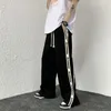 Spodnie męskie Dwa paski Grafika z literami Męskie spodnie na co dzień Główna ulica Hip-Hop Luźne proste spodnie Czarny Sport Unisex