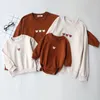Roupas de roupas familiares Millancel Family Combating Roupfits de manga comprida Tshirt Baby Bodysuit com chapéu urso Mãe Roupas de filhos 220913