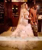 2022 Luxury Mermaid Wedding Dresses Bridal Gowns Plus Size Sexy Arabic Jewel Neck Illusion Long Sleeves Champagne Embroidery Lace Appliques Ruffles Tiered