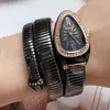 Polshorloges 2022 Luxe goudslang kronkelende horloges Women Fashion Crystal Quartz Bangle armband dames geschenken