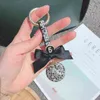 Keychains 2021 New Creative Diamond Crystal Ball Keychain Fashion Trend Personality Car Keychain Ladies Bag Bow Gift Pendant Keychain T220909