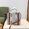 2022 Womens Shopper Fashion Uses Fashes Pags Handbag Nylon Hobo Linen Beach Beach Pags Luxury Designer Travel Crossbody Counter Bag Partes with Woody Ribbon