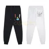 Mens Fashion Brand Casual Pants Fitness Women Sportswear Print Bottoms Skinny Sweatpants Trousers Asian Size M-2XL