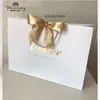 Geschenkverpackung 100x Papierbeutel Geschenkboxen Rohstoffverpackung Handtasche anpassen mit Rahmeneinkaufstaschen Hochzeit Geschenke Wickeln 220913