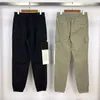 22SS Spring STONE Moda Hombres Pantalones de algodón Brújula básica Insignia Bordada ISLAND Herramientas Pantalones de bolsillo Pantalones deportivos 091512