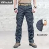 Мужские брюки Мужские города тактические брюки Многократные карманы эластичности грузовые брюки военные боевые брюки с хлопчатобумажными брюками.