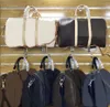 2022 Duffel Mens Designer Bag Clutch on Luggage Bag Men كرة السلة لكرة السلة 55 50 PVC Clear Handbag Duffle