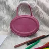 ショルダーバッグブランドCE Trimphal Arch Portable Moon Women 2022 Spring New Fashion Pink Pig Nose Mini Round Cake Bag