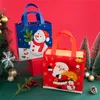 Gift Wrap StoBag 12pcs Marry Christmas Non-woven Fabric Candy Gift Packaging Tote Bags Santa Claus Kids Holiday Happy Year Party Favors 220913