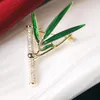 Broches Moda Mulheres elegantes Pinos de cristal de bambu elegantes esmalte