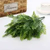 Fiorini artificiali 1pc di vegetazione floreale in finto con piante di plastica di plastica di erba verde foglia foglie foglie foglie false per la decorazione del matrimonio in casa articoli per feste j220906