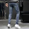 Jeans heren vier seizoenen Koreaanse mode veelzijdige jeugd casual mid rise slank fit kleine rechte elastische broek