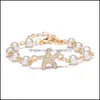 Bracelets De Charme Mode Cristal Strass Infinity Bracelets Étoile Étoile De Mer Croix Papillon Ange Ailes Charme Imitation Perle Perles B Dh6U3