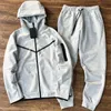 Мужские спортивные костюмы Tech Fleece Hoodies Спортивный костюм Дизайнерская спортивная одежда Брюки Женщины Мужчины Повседневные спортивные костюмы на молнии Спортивные штаны Костюмы Пуловеры Куртки