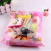 Christma Supplie NUOVO 10pc Squihie Medio Mini Pane Morbido Chiave Banana Torta Toat Kawaii Squihy Confezione Giocattolo Casuale 0914