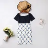 Family Matching Outfits Mommy and Me Clothes Parent-child Mother Girl Off-the-shoulder Printed Skirt One-shoulder Women's Clothing 220914