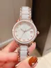 Brand Classic Sapphire Quartz Watch Natural Mother of Pearl Dial Women rostfritt st￥l kalender armbandsur kvinnlig vit keramisk rem klocka vattent￤t 33mm