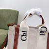 2022 Womens Shopper Fashion Totes Fashes Pags Hand Hand Nylon Hobo Linen Lig Beach Facs Luxury Designer Travel Crossbody Counter Bag Bag Bag Bag مع شريط خشبي