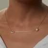 2022 otoño nuevos collares simples Retro hueso de serpiente Esmeralda y perla colgante cadena de clavícula mujer Ins exquisita joyería de moda