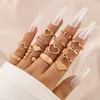 Nova moderna Letra do cora￧￣o Cora￧￣o Hollow Out Anel para mulheres Geometria Gold Alloy Metal Jewelry Gifts Anillo 14pcs