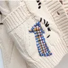 女性のセーター秋の冬女性カー​​ディガンウォームニットセータージャケットポケット刺繍ファッションニットカーディガンコートレディルーズセーター220916