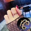 2022 new fashion European and American fashion glossy open ring trend creative personality diamond double cross female ring top quality