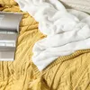 Coperte a maglia leggera coperta decorativa in maglia calda tessuta morbida e accogliente con nappa per divano e letto