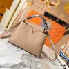 Borsa Capucines BB Mini borsa tote in pelle Taurillon a grana grossa Collezione Macaron Luxury Ladies Snake Print Fashion Flap Crossbody Top Handle