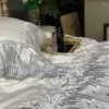 Set di biancheria da letto Set di pizzo da sposa principessa in cotone egiziano bianco di lusso Set copripiumino in raso setoso Lenzuolo o federe copriletto